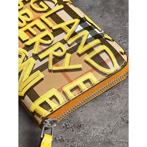 burberry graffiti wallet|Burberry Men's Graffiti Logo Print Leather Ziparound Wallet.